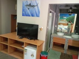 TV a/nebo společenská místnost v ubytování Seaview by Ukulhas