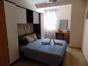 Postel nebo postele na pokoji v ubytování Apartments Las Cabezas