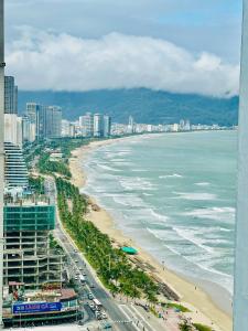 an aerial view of a beach and the ocean at My Khe Beach-My An Son Tra Da Nang-ANV APT in Da Nang +6 photos