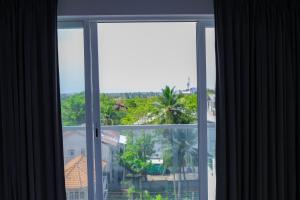 En balkon eller terrasse på Prime Holiday