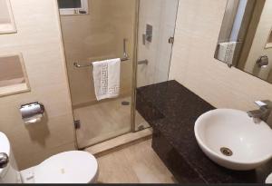Koupelna v ubytování Madhuban Hotel , New delhi