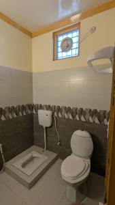 Koupelna v ubytování Kashmir cottage Dhani