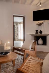 TV a/nebo společenská místnost v ubytování Pure Mykonos Villa