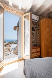 Postel nebo postele na pokoji v ubytování Pure Mykonos Villa