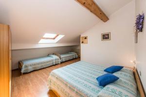 Postel nebo postele na pokoji v ubytování Albergo Antica Rosa