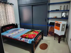 Corporate Hostel & PG客房内的一张或多张床位