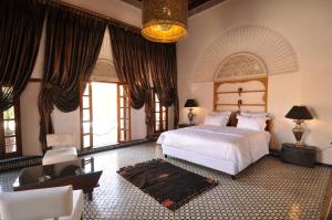 מיטה או מיטות בחדר ב-Riad Said