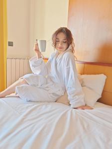 Voodi või voodid majutusasutuse Pohorje Village Wellbeing Resort - Forest Hotel Videc toas