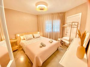Katil atau katil-katil dalam bilik di La Casita de la Playa-Bungalow
