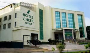 a building with a hotel cyber roule in front of it at Hotel Cheer Royale in Bareilly