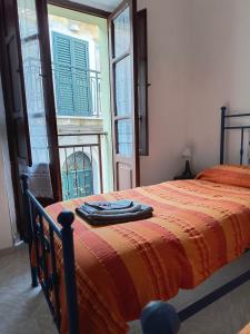 Letto o letti in una camera di Casa Titti. Intero Appartamento - Fossacesia