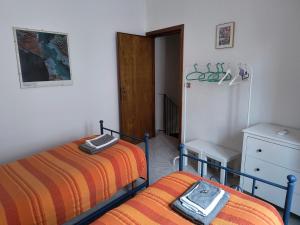 Letto o letti in una camera di Casa Titti. Intero Appartamento - Fossacesia