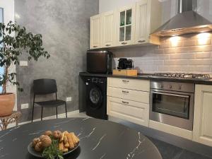 Η κουζίνα ή μικρή κουζίνα στο Casa Rossana - 15min from Venice +6 φωτογραφίες