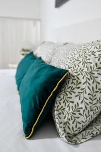 Voodi või voodid majutusasutuse Loftas Smaragdas toas