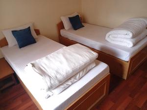 Letto o letti in una camera di My Garden House