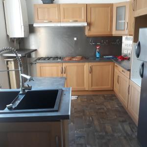 Køkken eller tekøkken på T4 chaleureux en plein centre