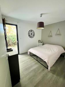 Ένα ή περισσότερα κρεβάτια σε δωμάτιο στο Peaceful house for 6 people 400 m from the sea +7 φωτογραφίες