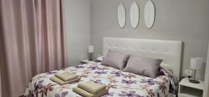 Postel nebo postele na pokoji v ubytování Los Cancajos Apartamento Acijoa