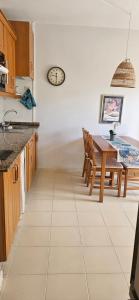 Kuchyň nebo kuchyňský kout v ubytování Los Cancajos Apartamento Acijoa