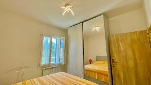 Ένα ή περισσότερα κρεβάτια σε δωμάτιο στο Villetta Niccolò