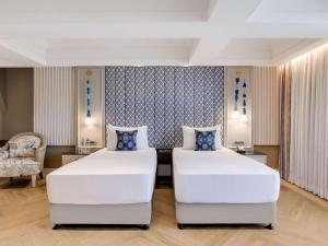 Grand Mercure Goa Candolim - An Accor Hotels Brand客房内的一张或多张床位