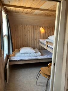 Postel nebo postele na pokoji v ubytování Thorsminde Camping & Cottages + 37 fotografií