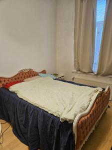 Postel nebo postele na pokoji v ubytování Asuntoni keskustassa