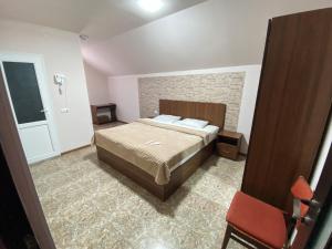 Ένα ή περισσότερα κρεβάτια σε δωμάτιο στο Home sweet Home