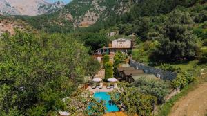 an aerial view of a resort with a swimming pool at La Dia Hotel Faralya in Fethiye