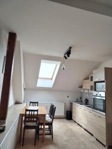 Kuchyň nebo kuchyňský kout v ubytování Apartmán Nerudovka
