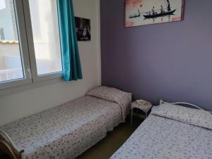 Postel nebo postele na pokoji v ubytování Marleo
