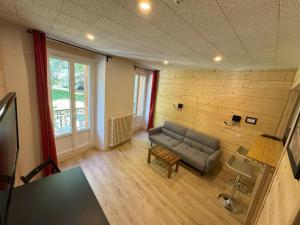 TV a/nebo společenská místnost v ubytování Aparthotel Le Petit Train
