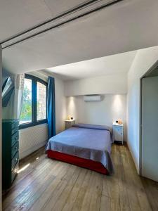 Giường trong phòng chung tại Villa Panoramica Pietraviva Golfo Di Gaeta