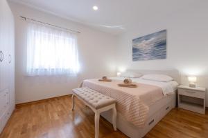 Posteľ alebo postele v izbe v ubytovaní Villa Laura