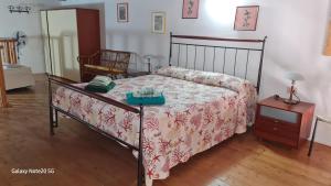 Postel nebo postele na pokoji v ubytování La Casa di Tella - Portopaglia free wifi - free parking