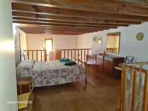 Postel nebo postele na pokoji v ubytování La Casa di Tella - Portopaglia free wifi - free parking
