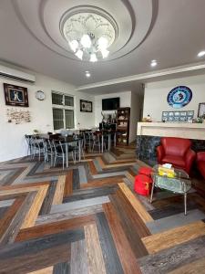 a living room with a couch and a fireplace at 小琉球觀海洋客棧View Ocean Inn in Xiaoliuqiu