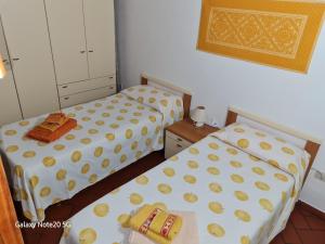 Postel nebo postele na pokoji v ubytování La Casa di Tella - Portopaglia free wifi - free parking