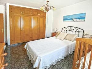 Cama ou camas em um quarto em Villa Francisca