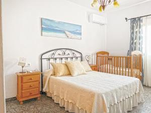 Cama ou camas em um quarto em Villa Francisca