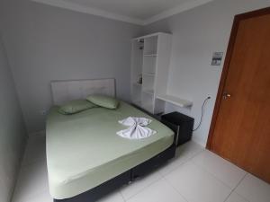 Postel nebo postele na pokoji v ubytování Hotel Vitória - Guaíra