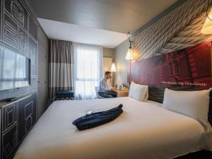 Letto o letti in una camera di ibis Montargis