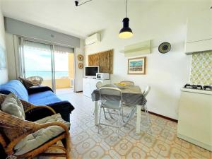 A kitchen or kitchenette at Nice apartment in Porto Santa Margherita with terrace