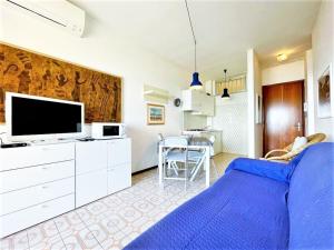 A kitchen or kitchenette at Nice apartment in Porto Santa Margherita with terrace