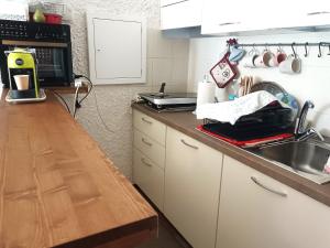 Kuchyň nebo kuchyňský kout v ubytování Zona Piazzale del Prel + 43 fotografií