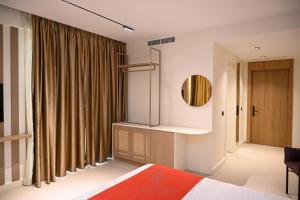 Letto o letti in una camera di Hotel Skanderbeg