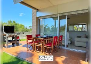 TV a/nebo společenská místnost v ubytování DOMuum Holidays - PARADISE VILLAGE GF