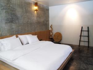 Postel nebo postele na pokoji v ubytování Bari Lamai Resort