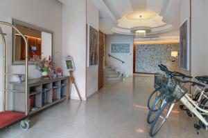 a hallway with bikes parked in a building at Hotel Nuvò in Naples