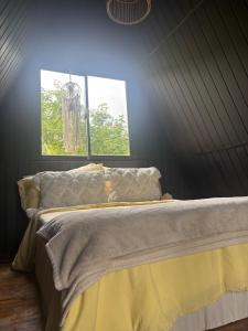 Postel nebo postele na pokoji v ubytování The ZenDen